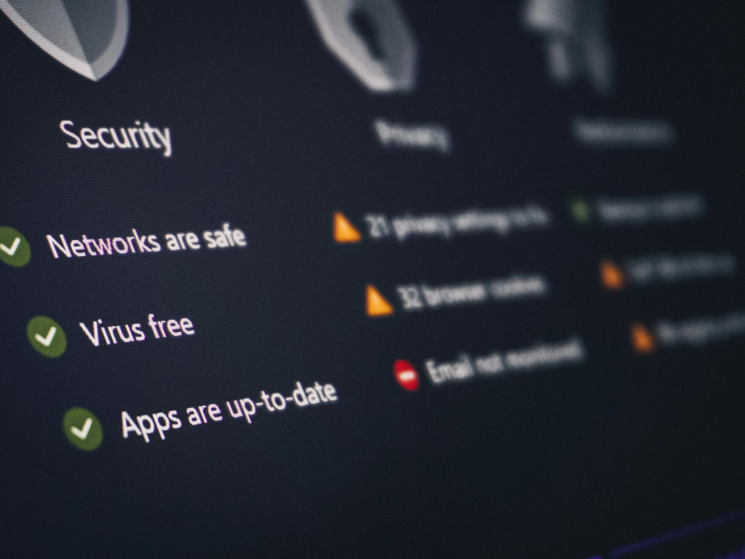 A security dashboard showing networks safe, virus free and apps up to date